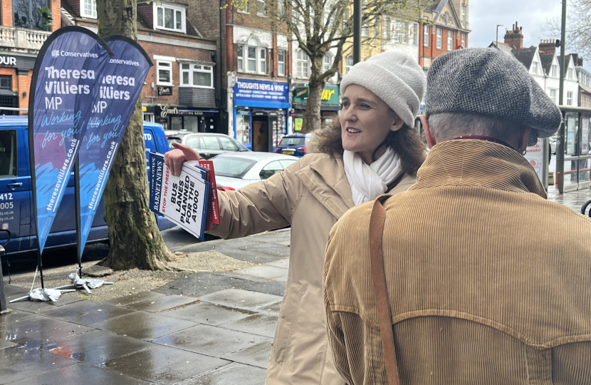 Theresa Villiers in Whetstone High Road talking to local residents