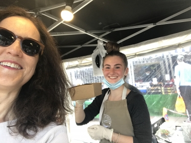 Theresa Villiers buying lemon drizzle cake in Barnet Market