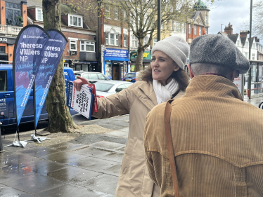 Theresa Villiers in Whetstone High Road talking to local residents